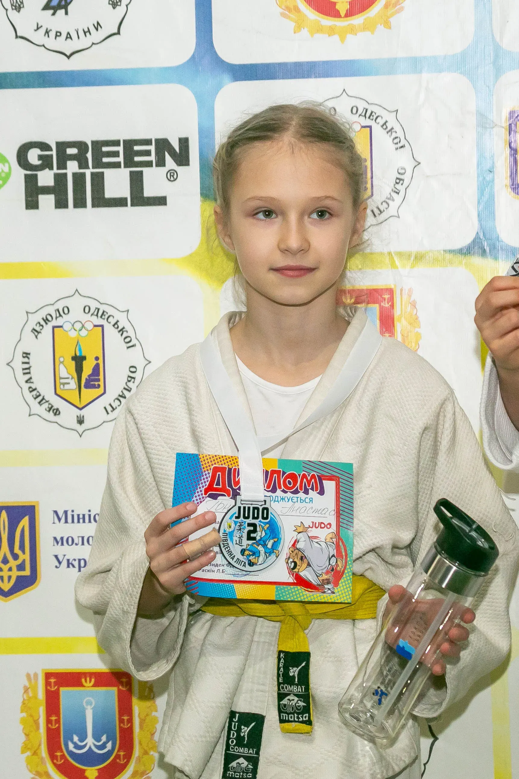 Радість перемоги – дзюдоїсти на п'єдесталі